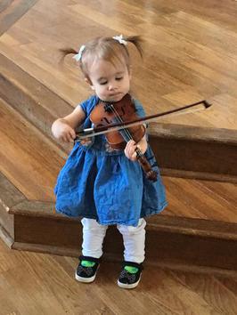 18-month old copies other children playing violin
